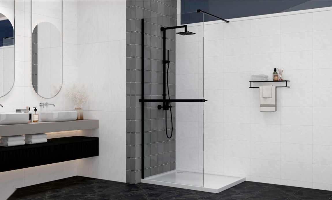White shower tray installed in a modern marble bathroom with black shower set